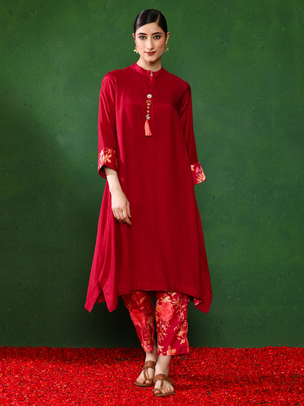 Maroon color Floral Solid A-Line Kurta and  Trousers Sets
