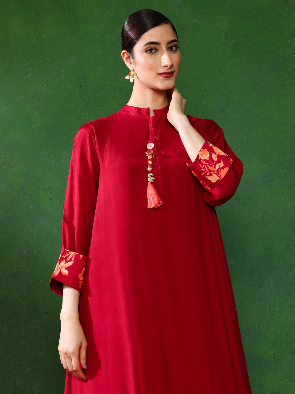 Maroon color Floral Solid A-Line Kurta and  Trousers Sets