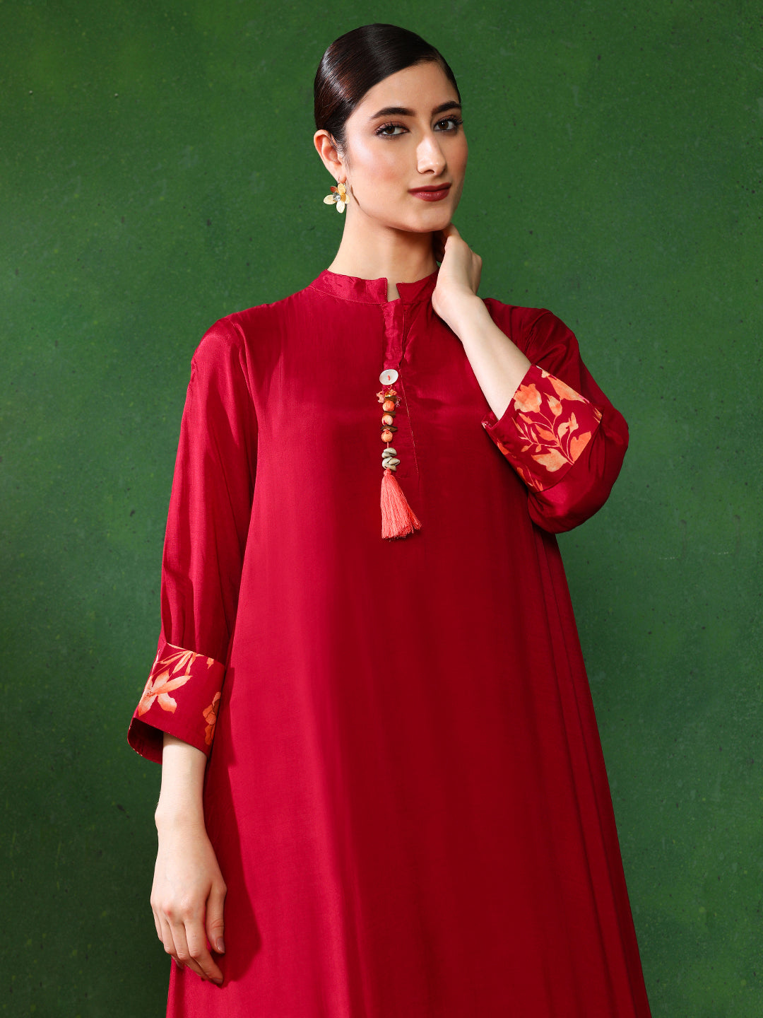 Maroon color Floral Solid A-Line Kurta and  Trousers Sets