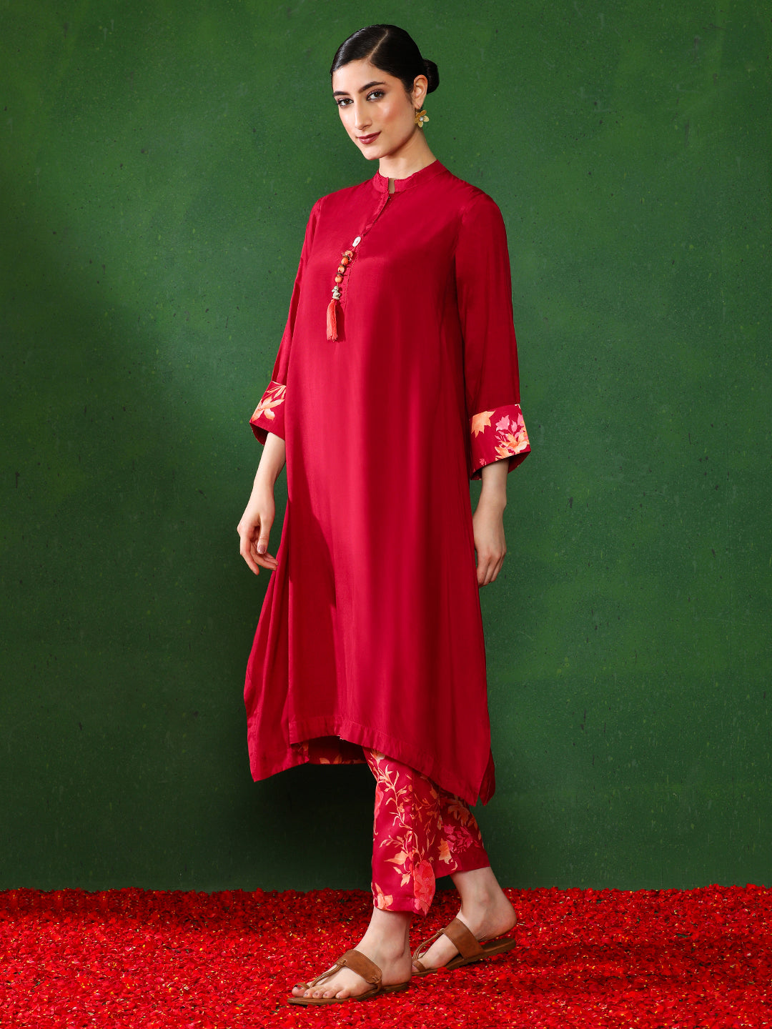 Maroon color Floral Solid A-Line Kurta and  Trousers Sets