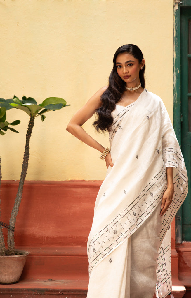White Linen With Geometric Jamdani Work along the border & on the Pallu