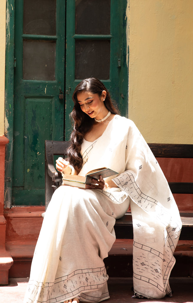 White Linen With Geometric Jamdani Work along the border & on the Pallu