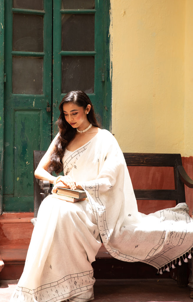 White Linen With Geometric Jamdani Work along the border & on the Pallu