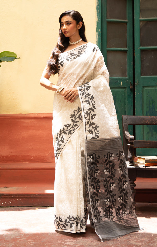 Swarn White Saree with Striking Flower Vine Woven Design in Black