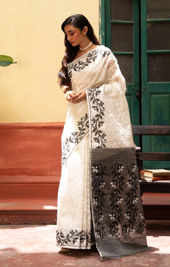 Swarn White Saree with Striking Flower Vine Woven Design in Black