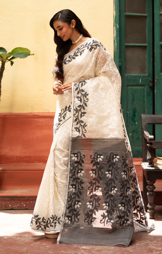Swarn White Saree with Striking Flower Vine Woven Design in Black