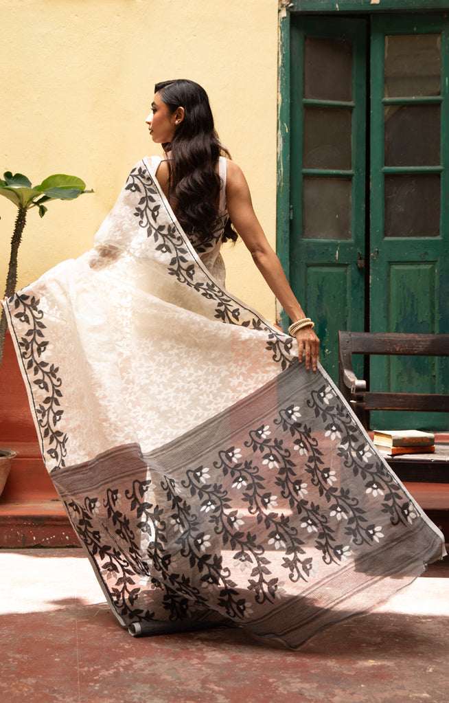 Swarn White Saree with Striking Flower Vine Woven Design in Black