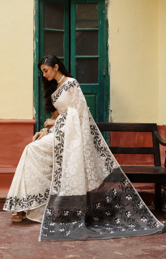 Swarn White Saree with Striking Flower Vine Woven Design in Black
