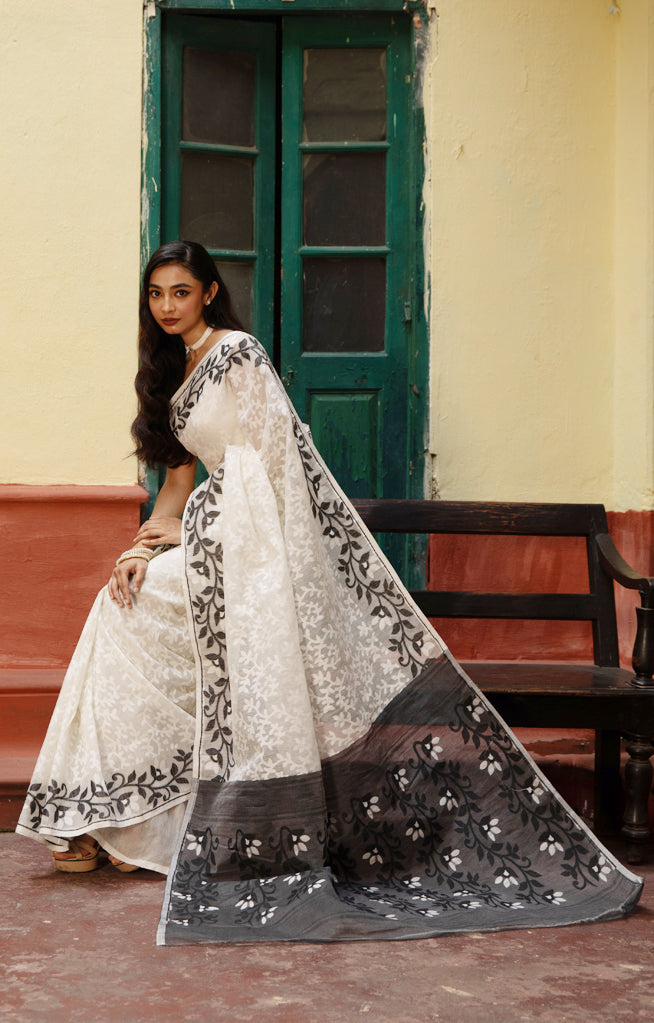 Swarn White Saree with Striking Flower Vine Woven Design in Black