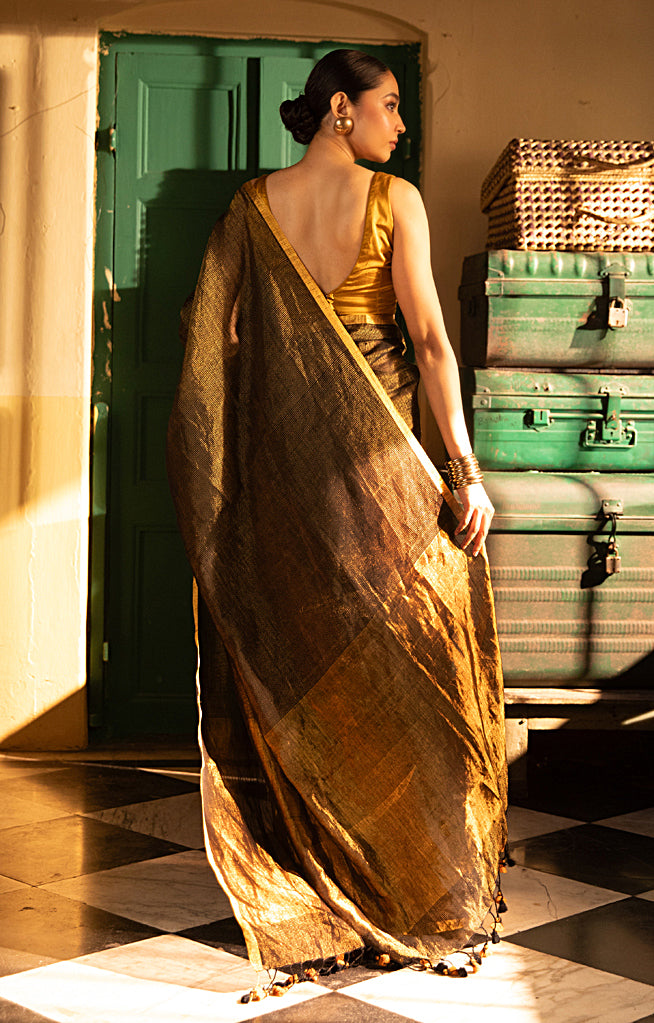 Versatile Black color and Tissue Linen Saree With a Thin and Zari Stripes