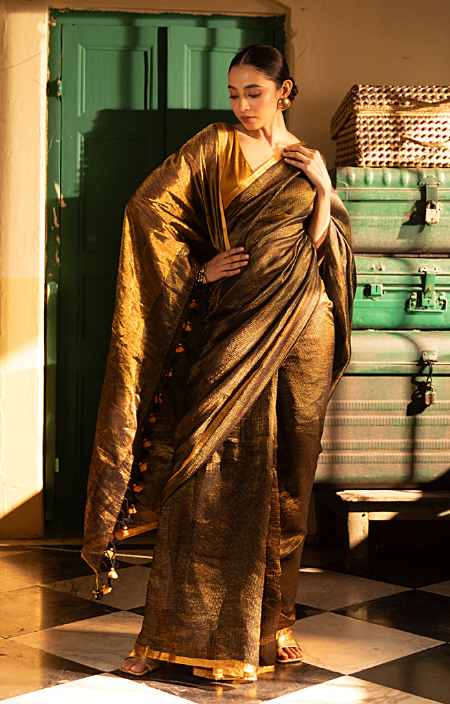 Versatile Black color and Tissue Linen Saree With a Thin and Zari Stripes