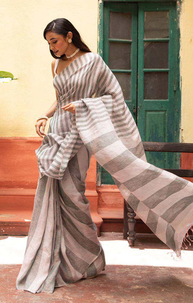 Grey & faded pink color with  Striped Linen Saree