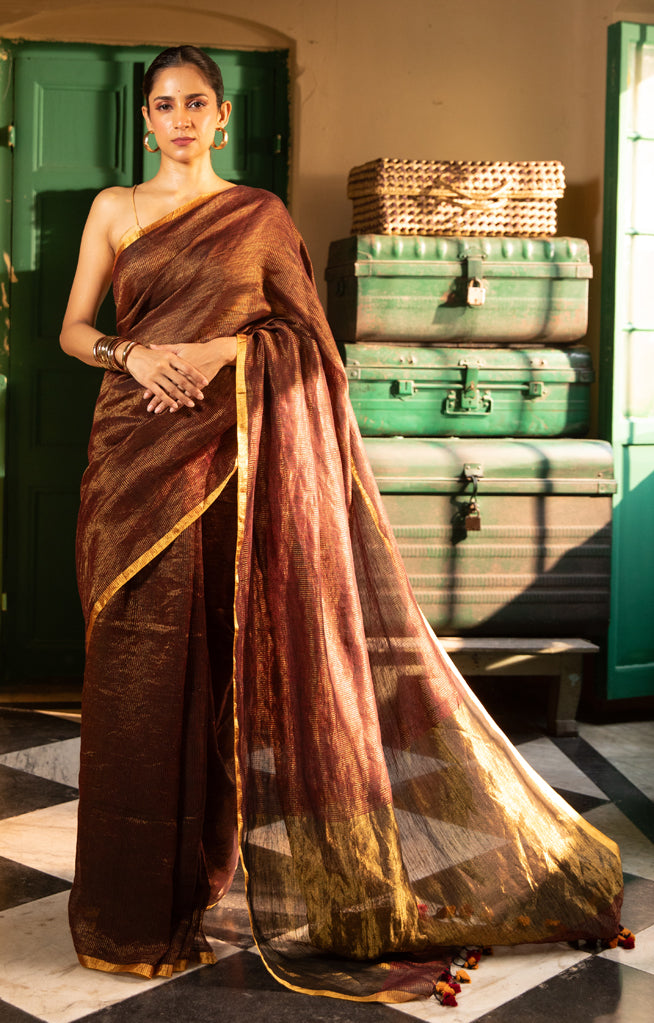 Gracious Bronze Tissue type organic Linen Saree With Thin and Zari work