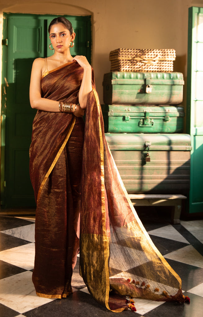 Gracious Bronze Tissue type organic Linen Saree With Thin and Zari work