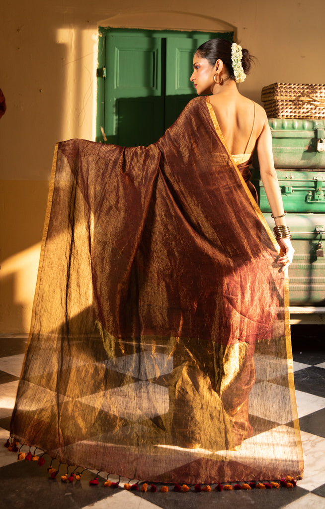Gracious Bronze Tissue type organic Linen Saree With Thin and Zari work