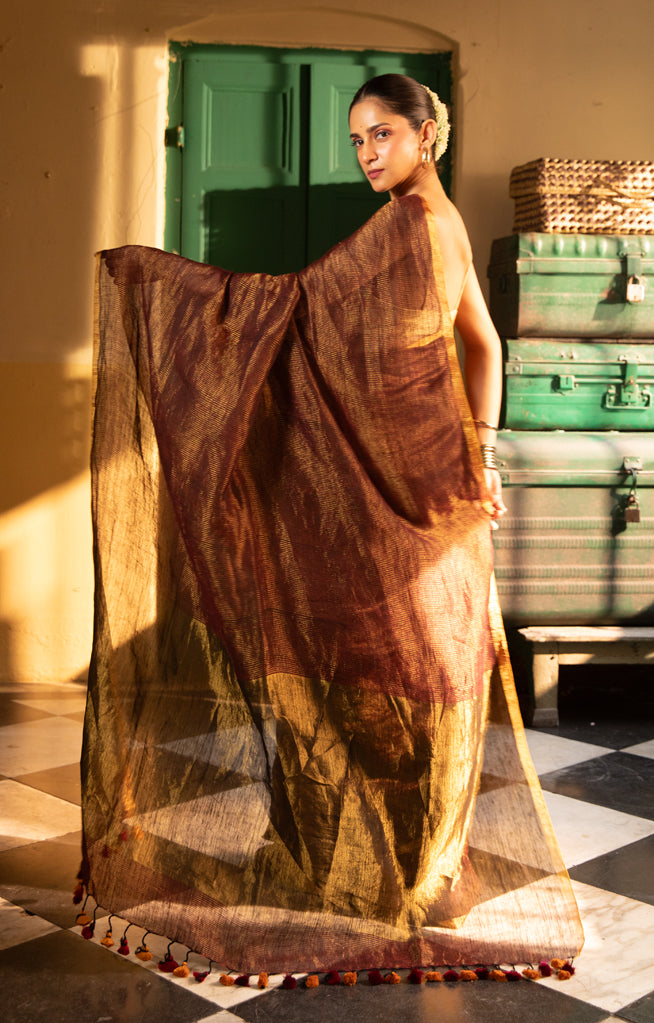 Gracious Bronze Tissue type organic Linen Saree With Thin and Zari work