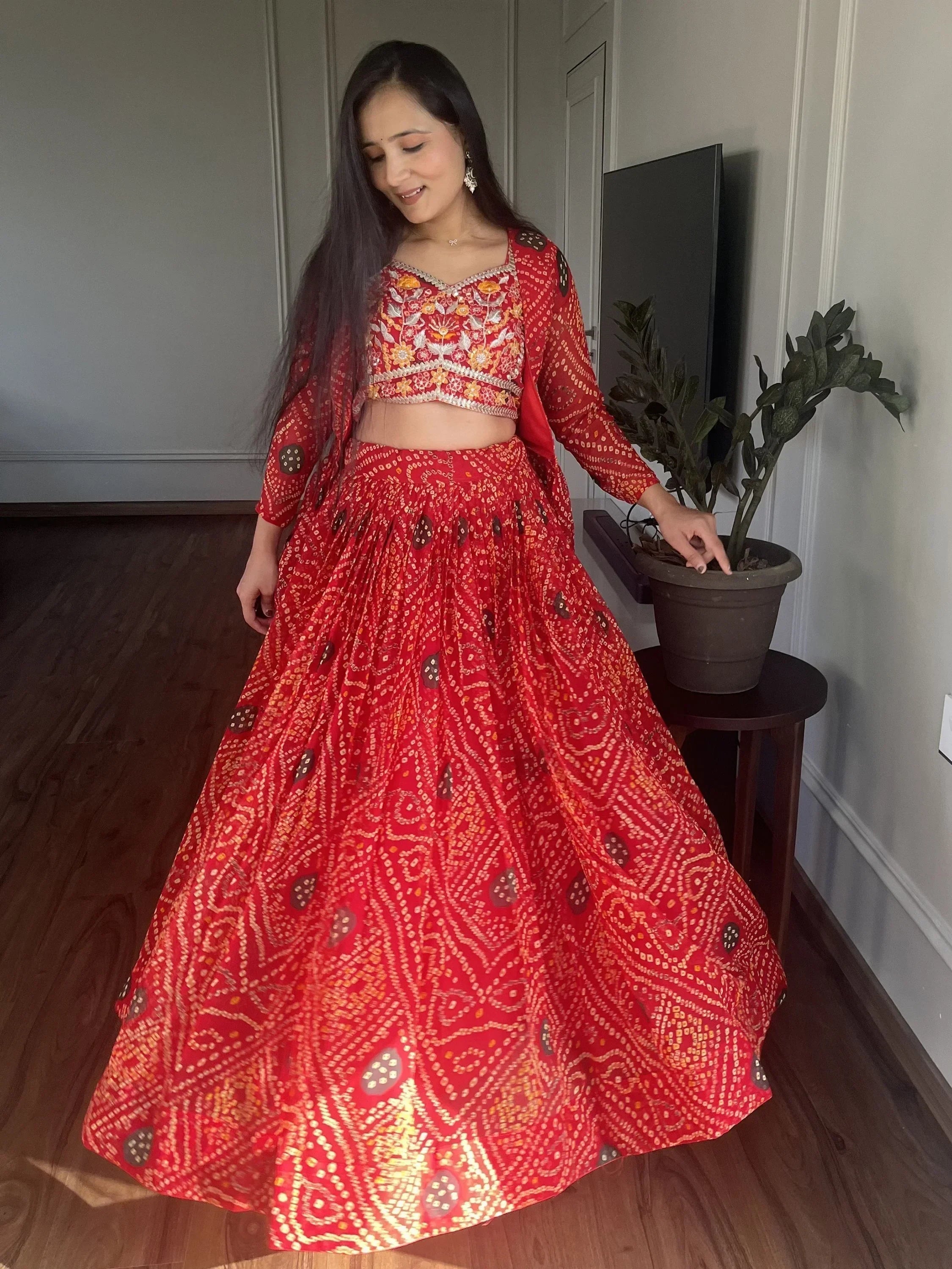 Ravishing Red Bandhani Printed Georgette  Lehenga Choli With Jacket